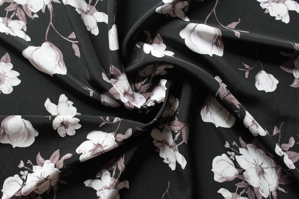 KOSHIBO YORYO CREPE 18202. DES. 38 COL.3 BLACK BACKGROUND Crepe Dress Fabric