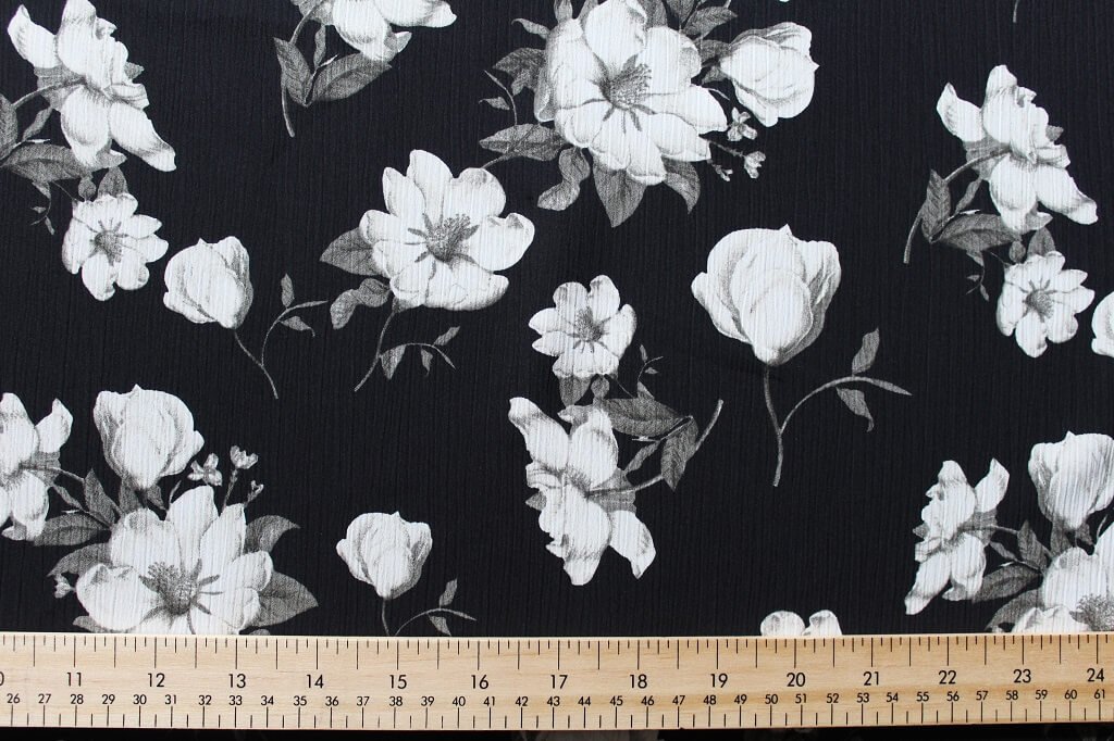 KOSHIBO YORYO CREPE 18202. DES. 38 COL.4 BLACK BACKGROUND Crepe Dress Fabric