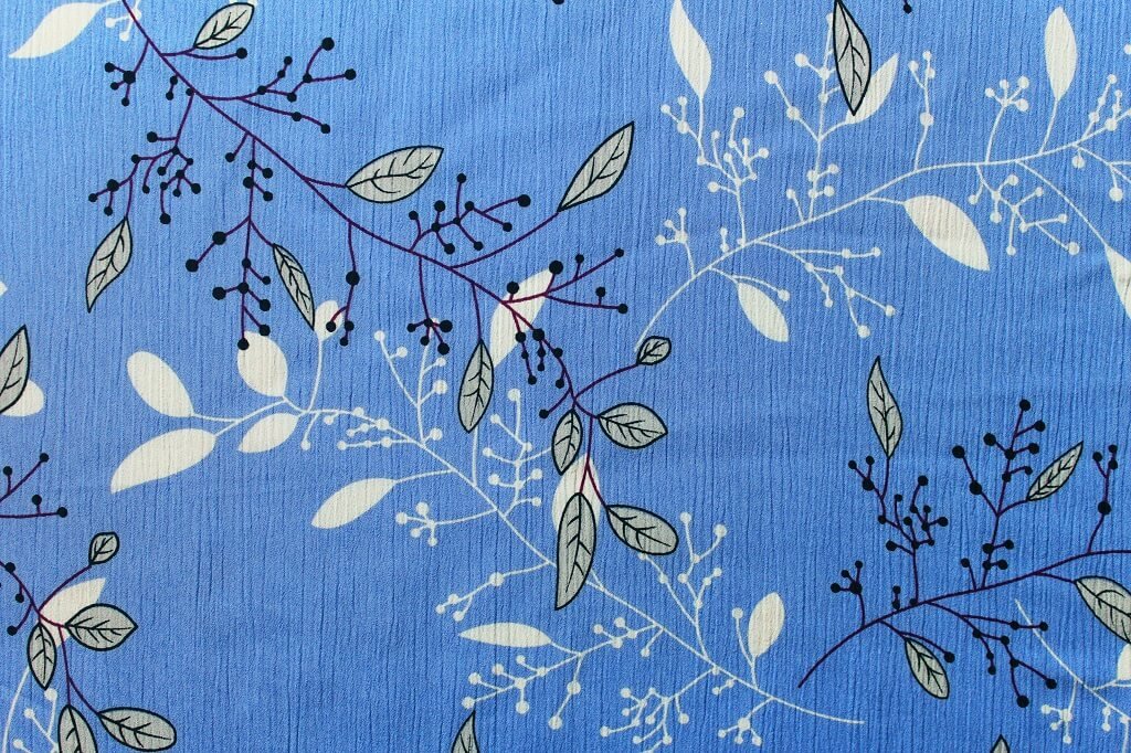 KOSHIBO YORYO CREPE 18202. DES. 76 COL.1 "LEAVES" BLUE BACKGROUND Crepe Dress Fabric