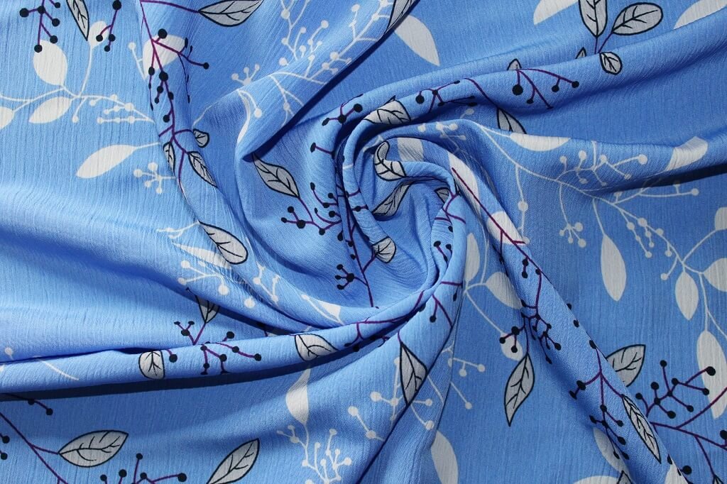 KOSHIBO YORYO CREPE 18202. DES. 76 COL.1 "LEAVES" BLUE BACKGROUND Crepe Dress Fabric