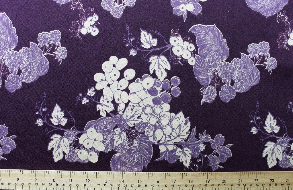 ITY KNIT JERSEY 18203. DES #2 COL 3 DARK PURPLE JERSEY FABRIC WITH GRAPES PRINT PURPLE
