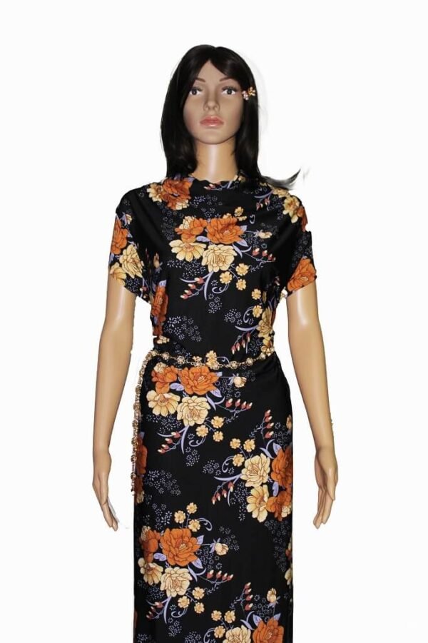 MODEL IS SHOWING A DRESS MADE FROM ITY JERSEY KNIT FABRIC FLORAL PRINT BLACK COLOR