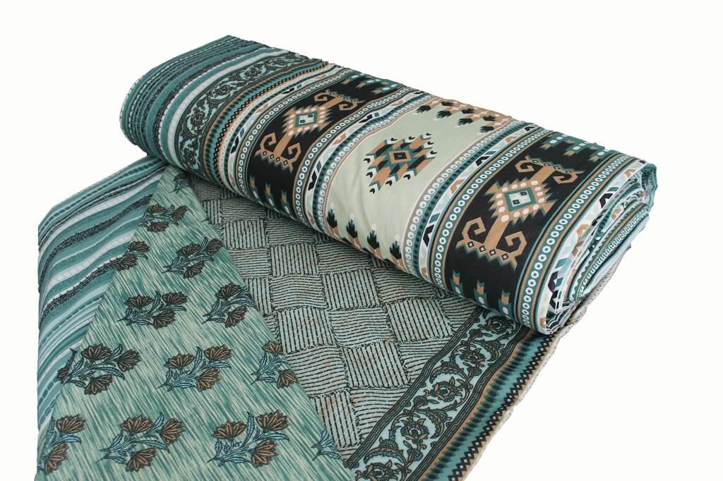 COTTON SHEETING 108'' INCH WIDE. DES. HJ-07 COL. MINT/GREEN/ORANGE (BOLT) A bolt of printed cotton fabric
