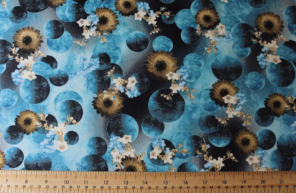 ITY KNIT JERSEY 18203. DES #3 COL 1 BLUE ITY JERSEY KNIT PRINT FABRIC BLUE BACKGROUND