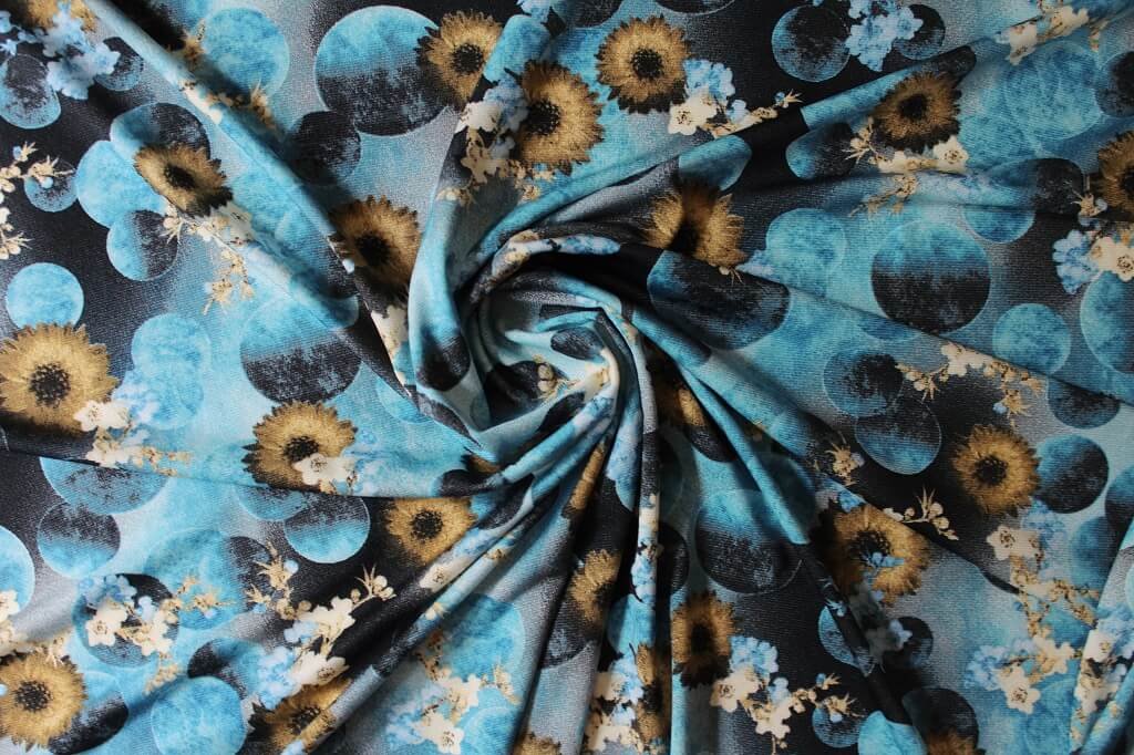 ITY KNIT JERSEY 18203. DES #3 COL 1 BLUE ITY JERSEY KNIT PRINT FABRIC BLUE BACKGROUND