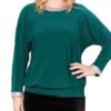 Model is showing a teal green shirt made from ITY Jersey Knit Fabric
