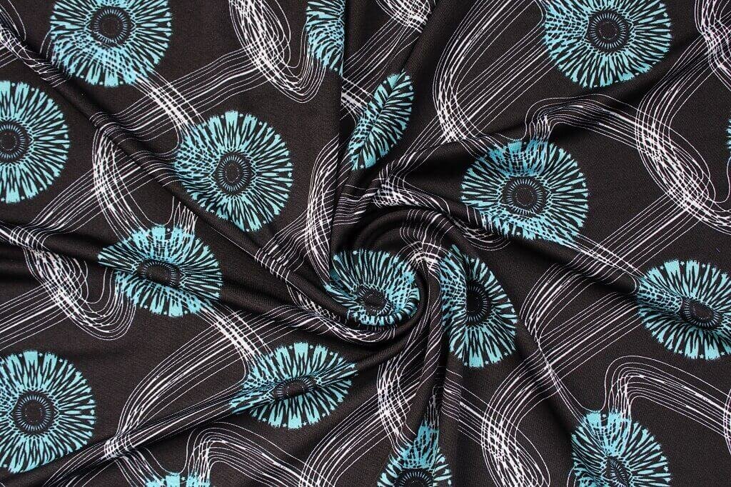 DTY JERSEY KNIT 18204. DES #25 COL.3 TURQUOISE DTY KNIT CIRCLE PATTERN TURQUOISE