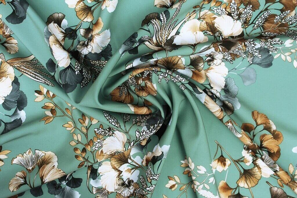 POLYESTER STRETCH DRESS FABRIC DES.5/1 OCEAN GREEN BACKGROUND Polyester stretch dress woven fabric green
