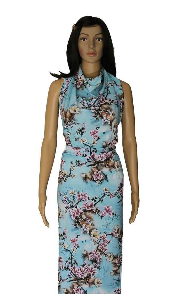 POLYESTER STRETCH DRESS FABRIC DES.8/2 SKY BLUE BACKGROUND Mannequin is showing a dress made from polyester stretch dress fabric floral sky blue
